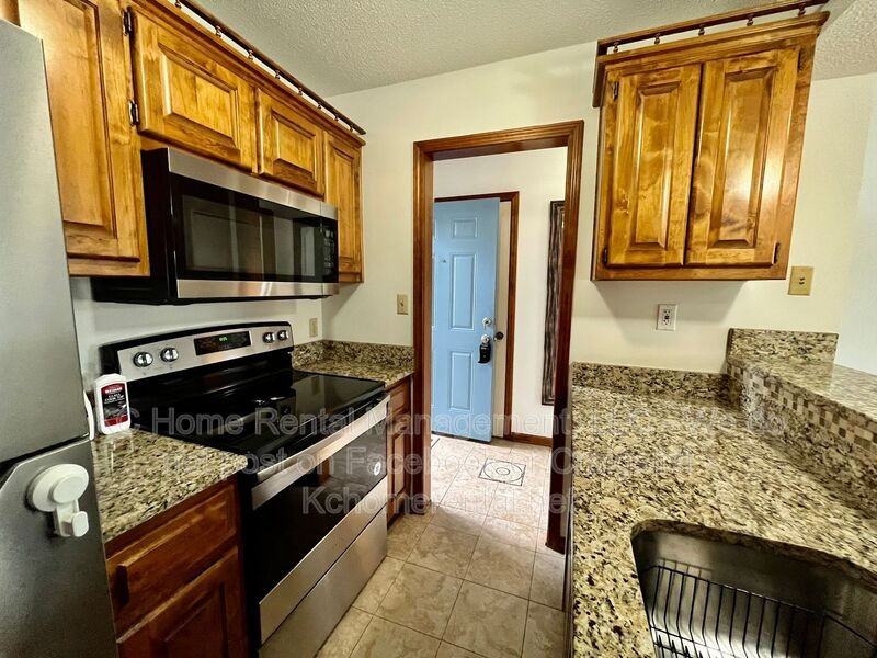 12027 W 58th Pl - Photo 4 of 21