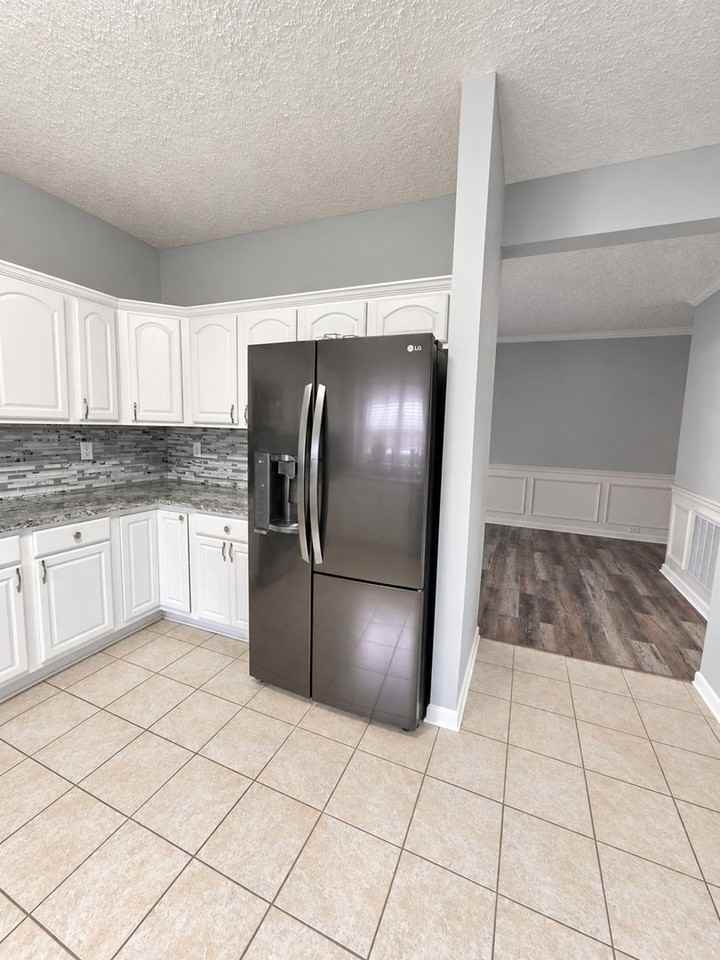 9822 Collier Ln - Photo 2 of 27