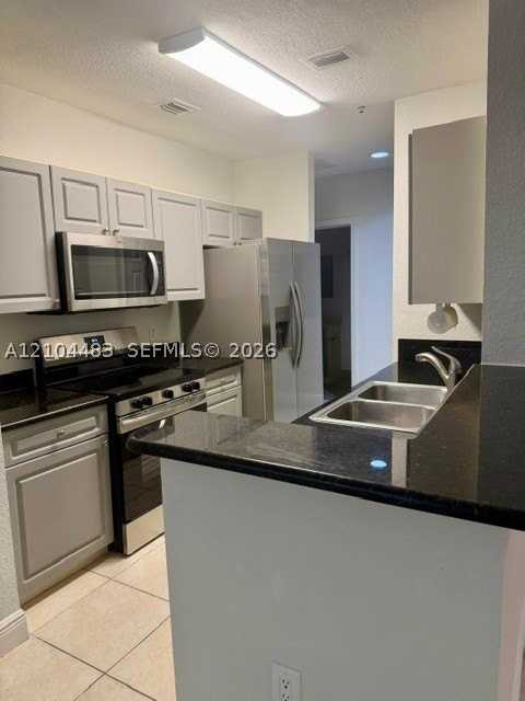 21150 Sw 87th Ave #304 - Photo 2 of 24