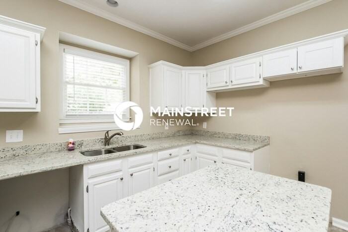 12191 Olmstead Dr - Photo 4 of 16