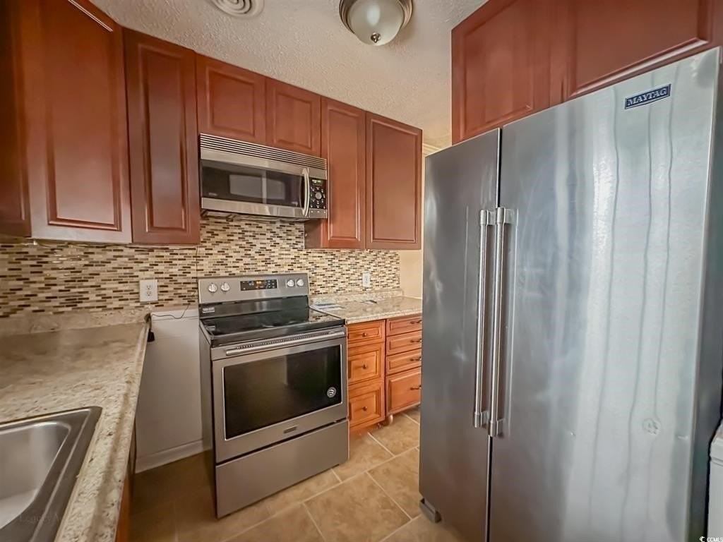 504 62nd Ave N #H - Photo 7 of 30