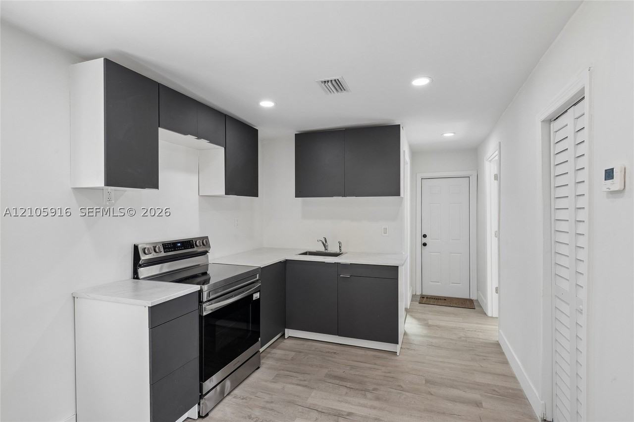 1063 Nw 55th Ter - Photo 4 of 13