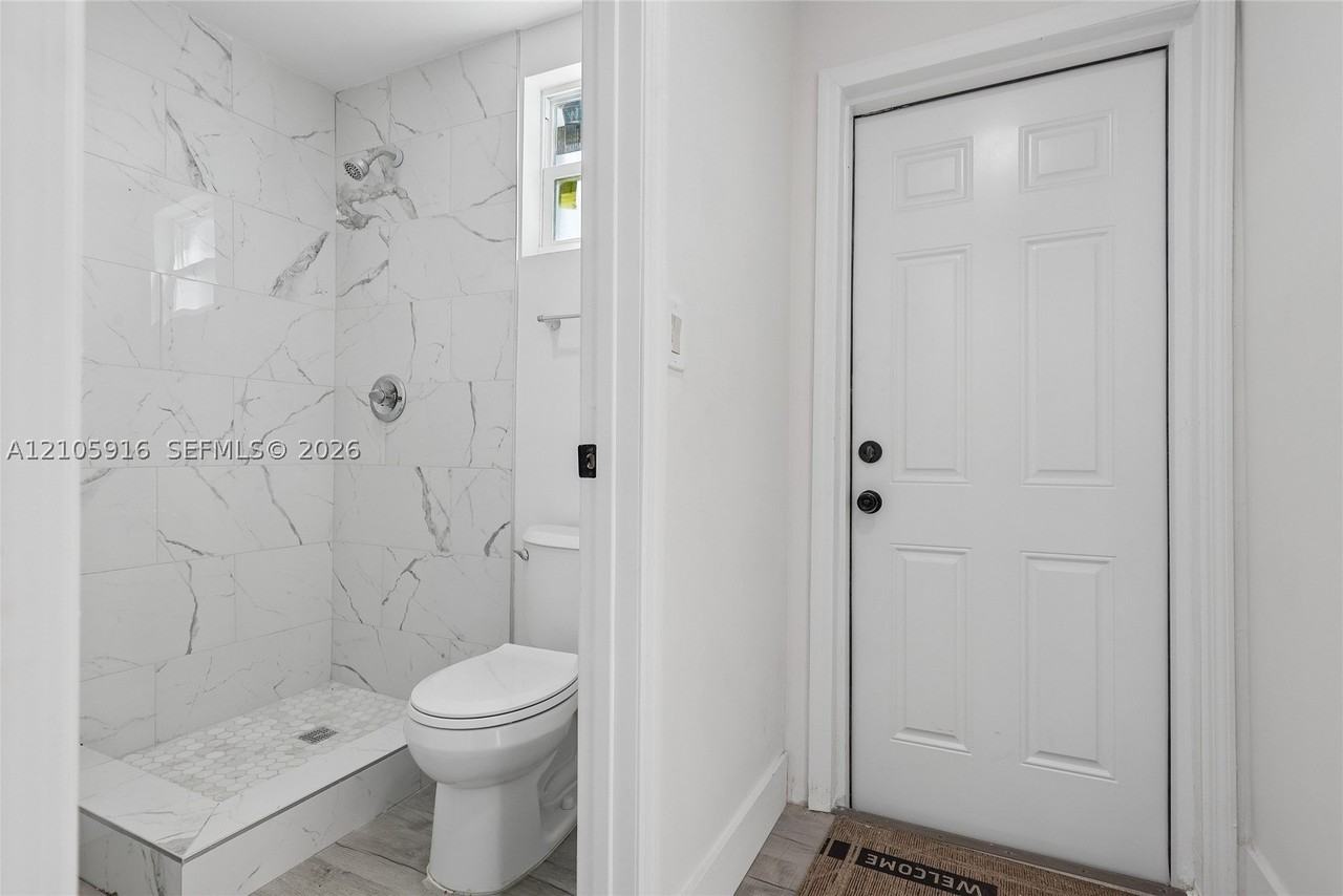 1063 Nw 55th Ter - Photo 7 of 13