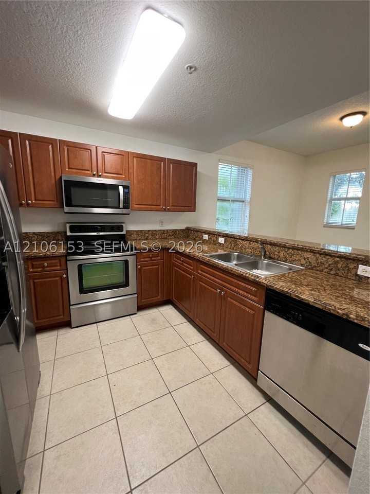 11101 Nw 83rd St #202 - Photo 7 of 26