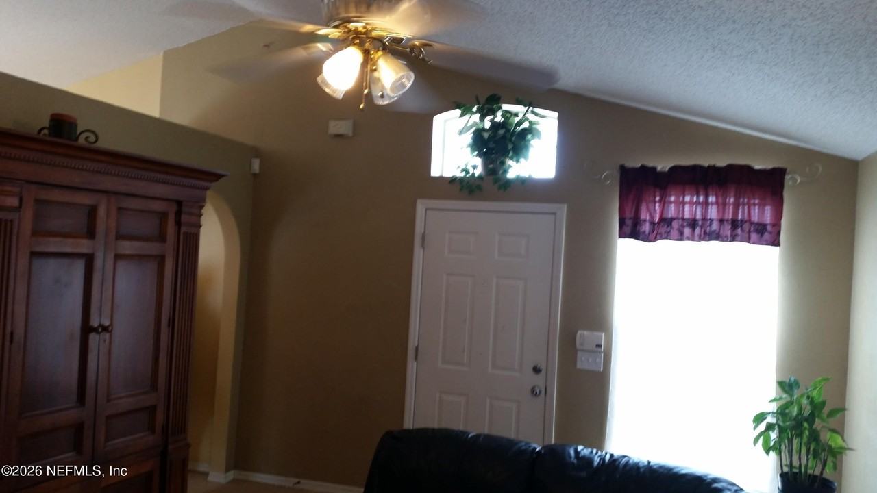 11801 Ashbrook Cir N - Photo 2 of 8