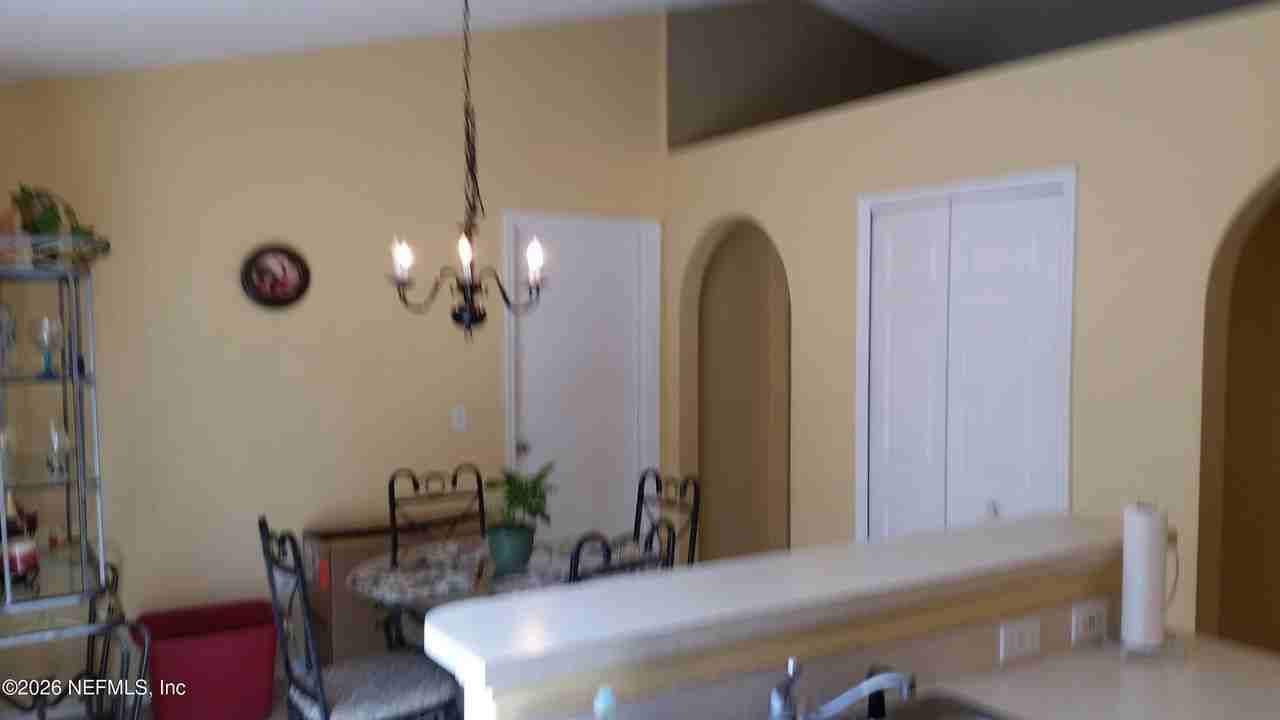 11801 Ashbrook Cir N - Photo 5 of 8