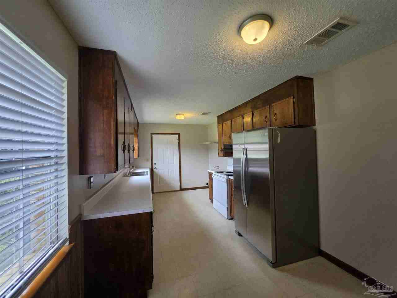 2014 Woodbury Dr - Photo 5 of 13