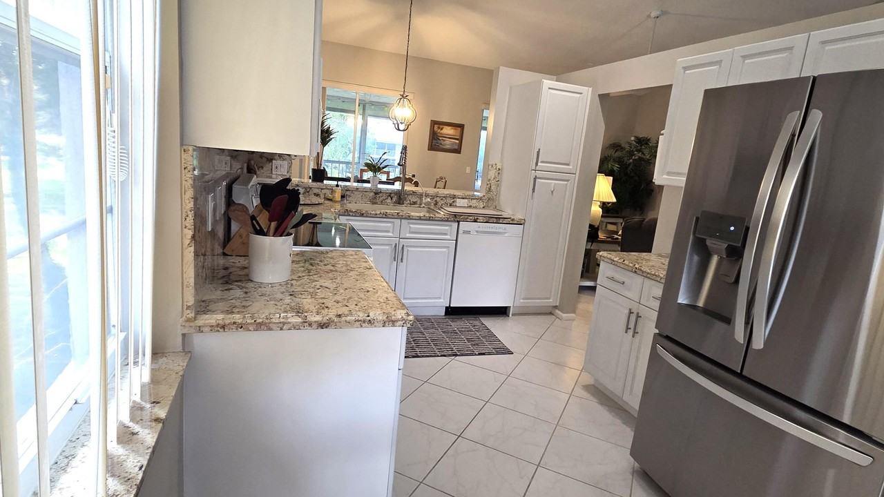 7634 Majestic Palm Dr #201 - Photo 5 of 15