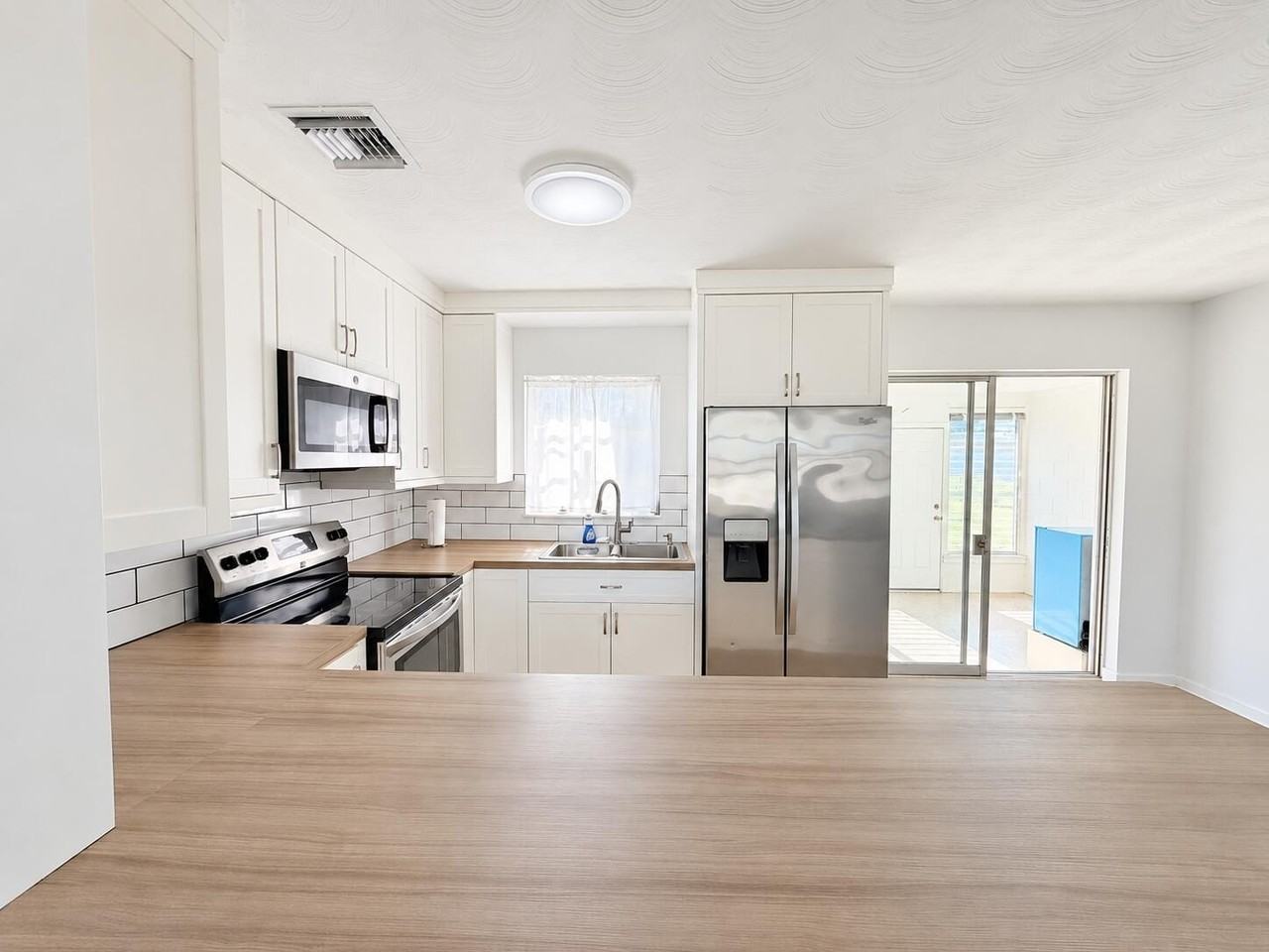 116 Ne Entrada Ave - Photo 5 of 27