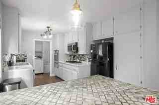 14034 Valerio St - Photo 4 of 7