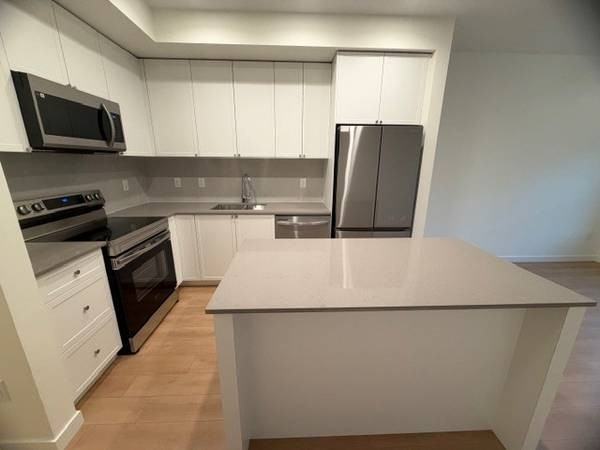 15780 Fraser Highway #302 - Photo 2 of 11