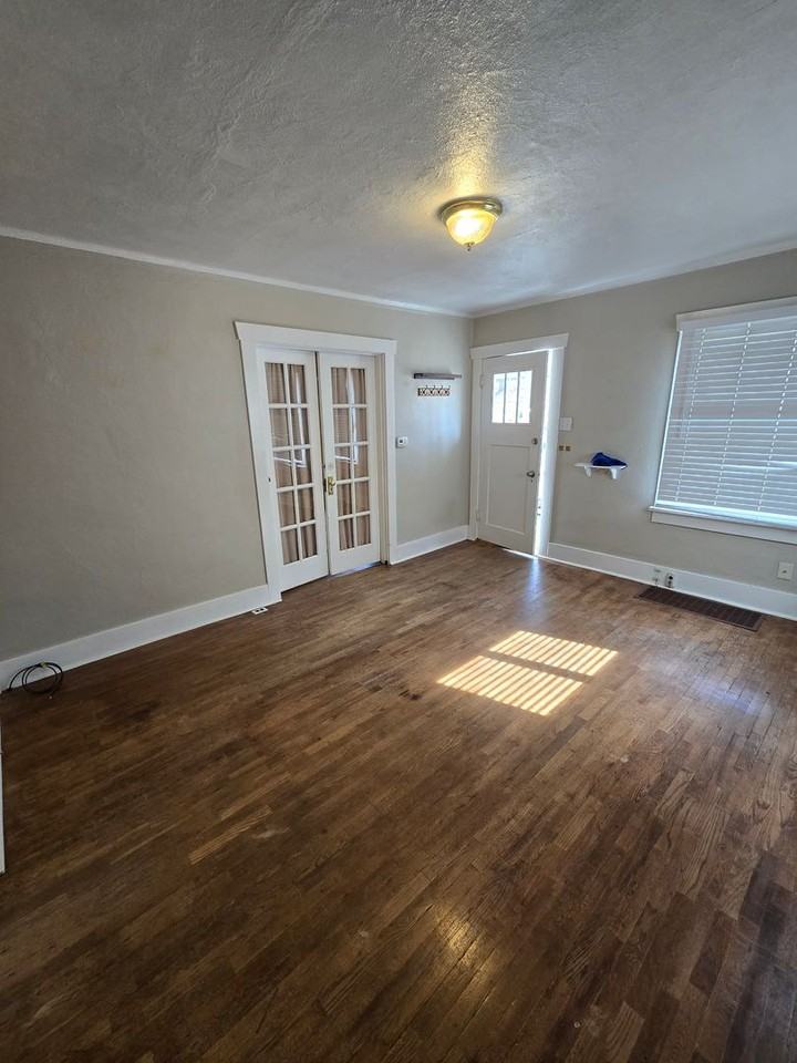 1107 S Ogden St - Photo 2 of 13