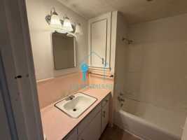 featured image of 323 E 9th St