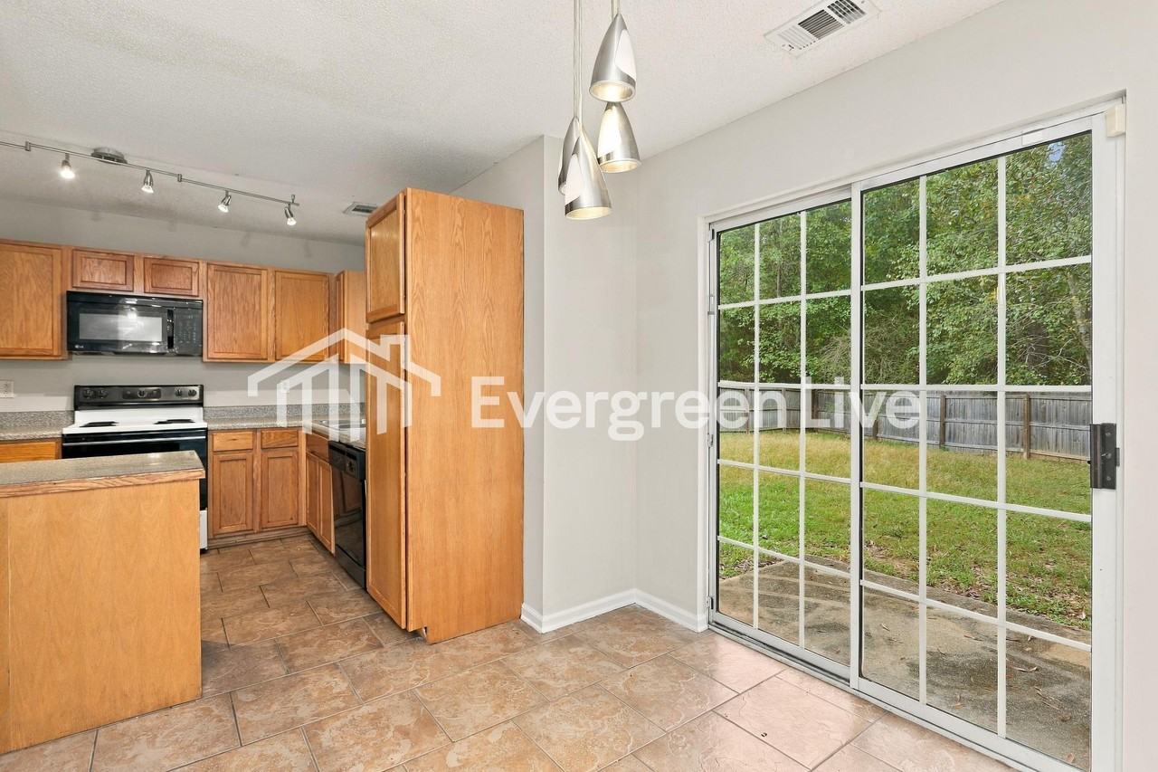 6980 Mahonia Pl - Photo 3 of 15
