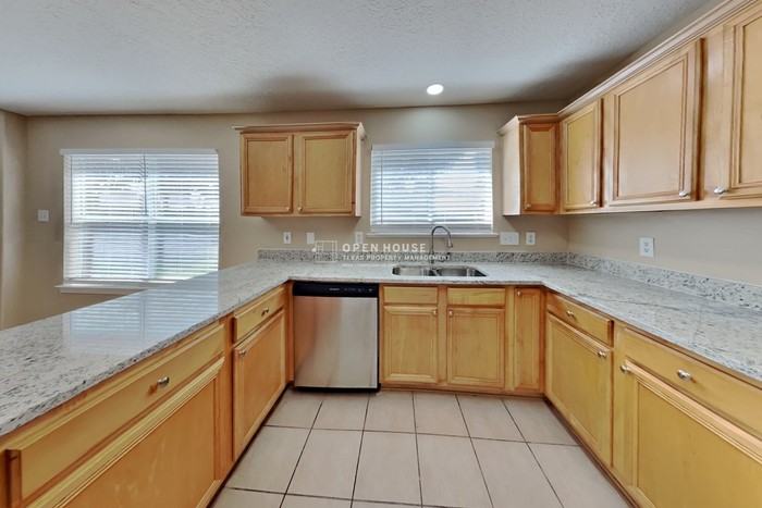 7034 Atasca Creek Dr - Photo 7 of 24