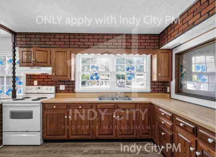 7911 E 33rd St - Photo 6 of 25