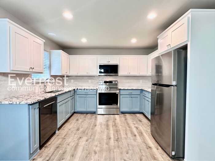 7012 E 71st Ct - Photo 4 of 19