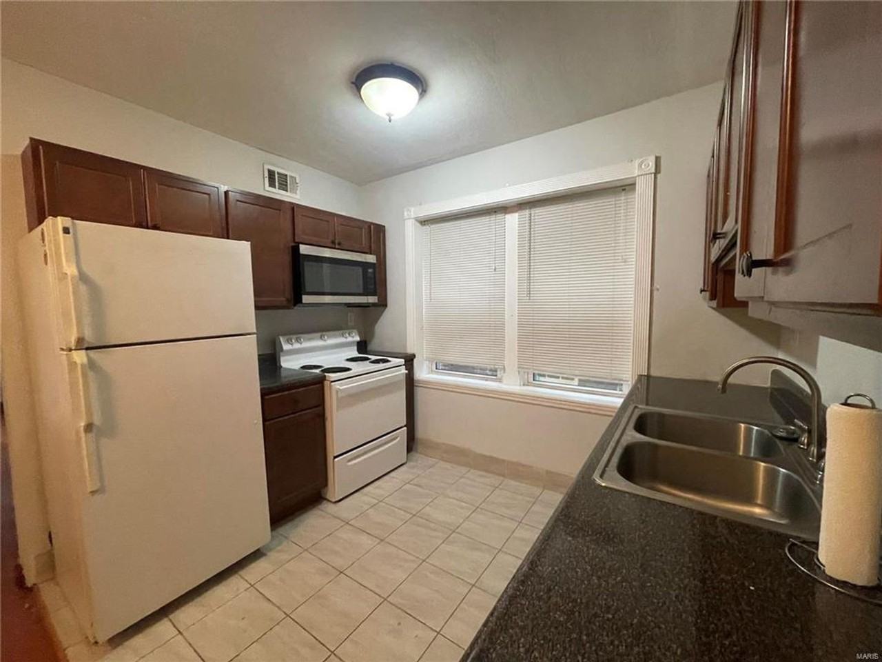 5031 Oleatha Ave - Photo 4 of 8