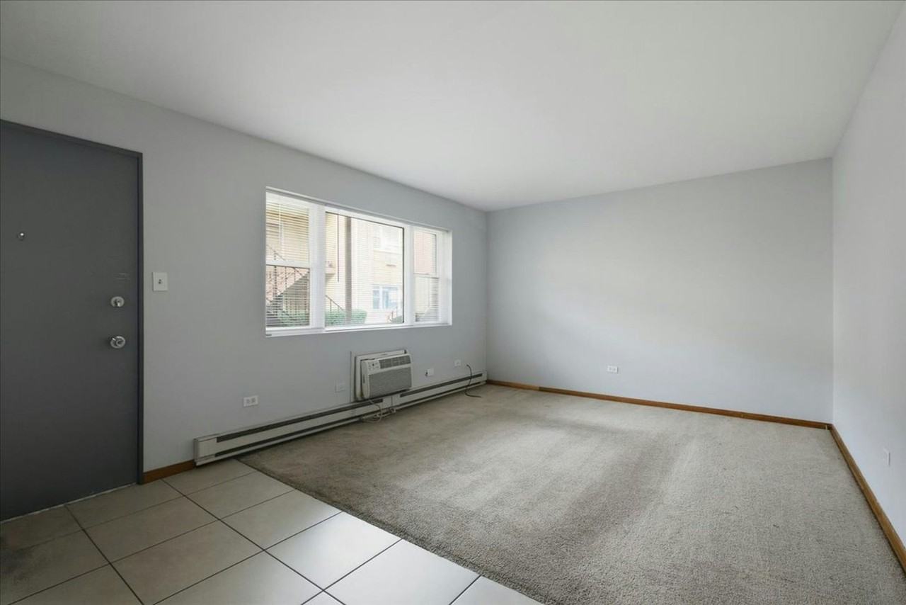 6206 West 64th Place, Unit 102 - Photo 3 of 8