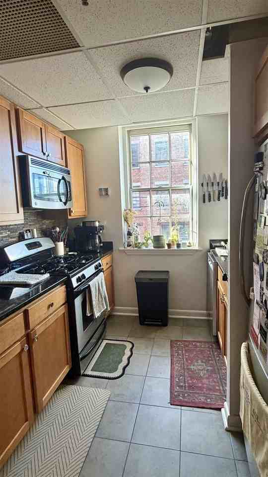 227 Christopher Columbus Dr #207B - Photo 3 of 9