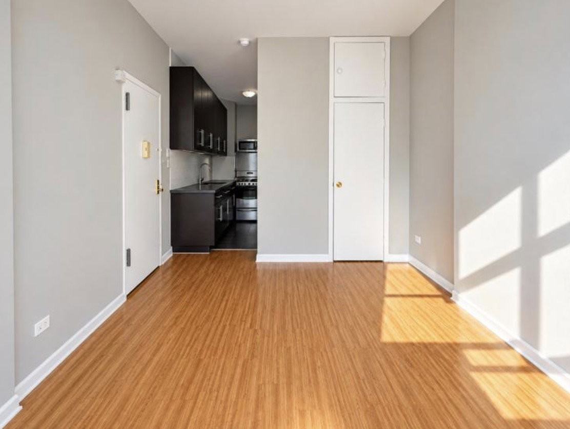 E 102nd St - Photo 5 of 7