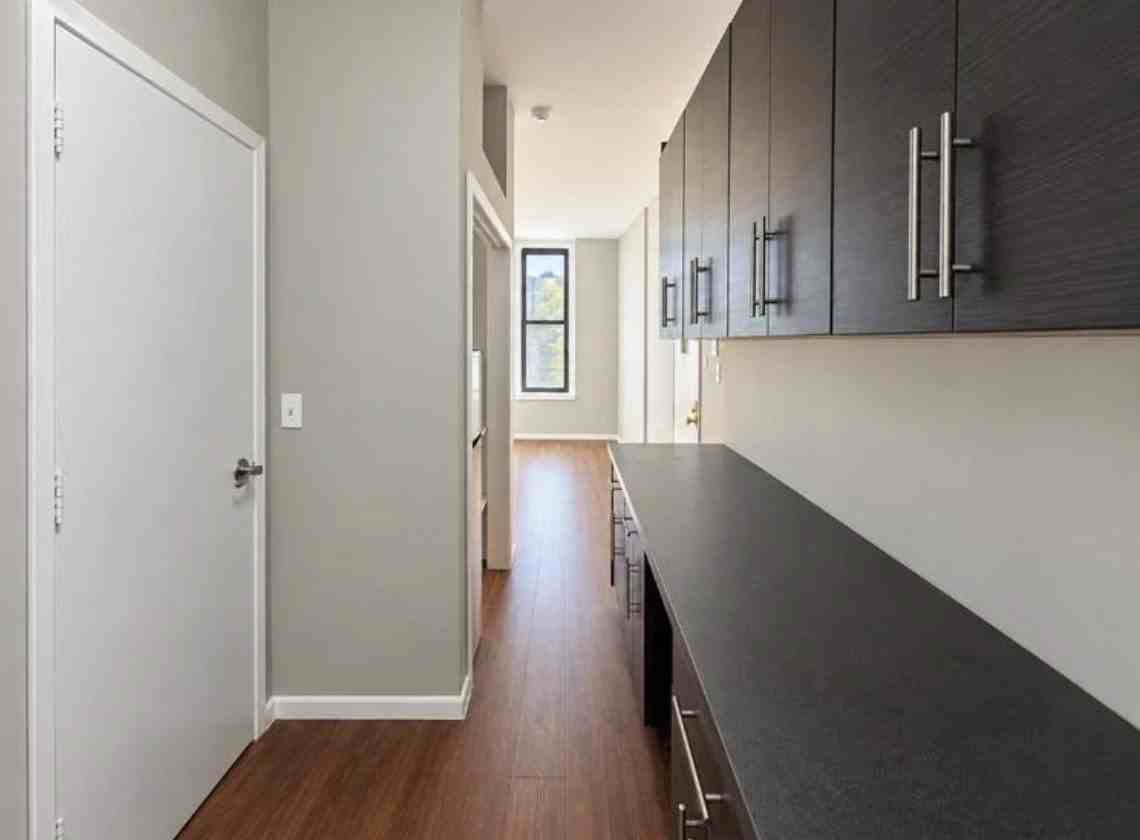 E 102nd St - Photo 6 of 7