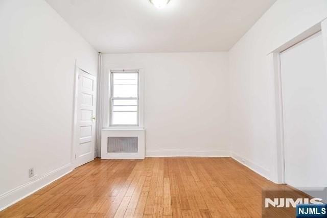 243 Washington Pl #1stFL - Photo 4 of 8