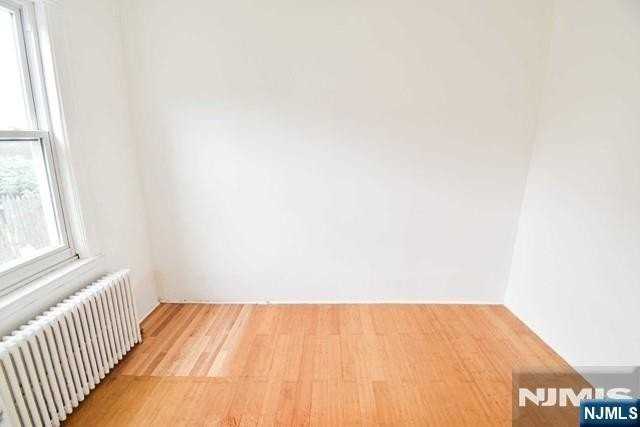 243 Washington Pl #1stFL - Photo 6 of 8