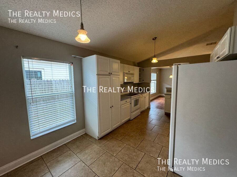10037 Tikimber Ln - Photo 7 of 32