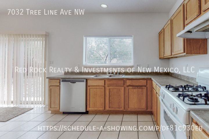 7032 Tree Line Ave Nw - Photo 6 of 16