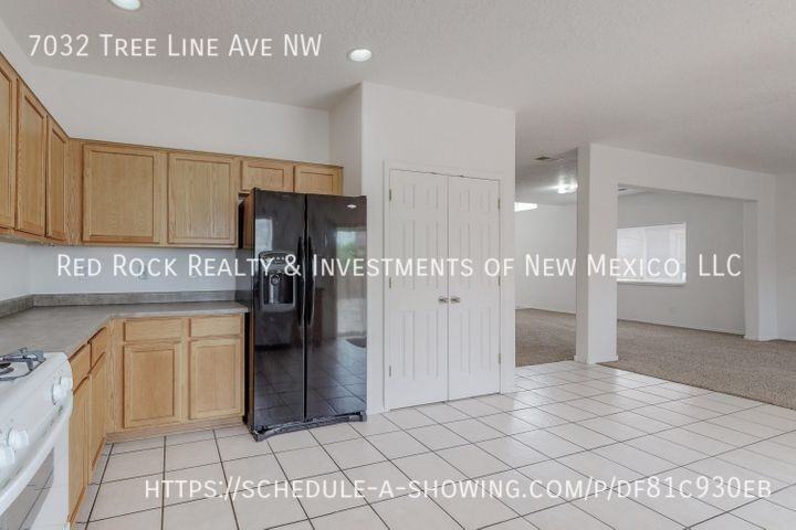 7032 Tree Line Ave Nw - Photo 7 of 16