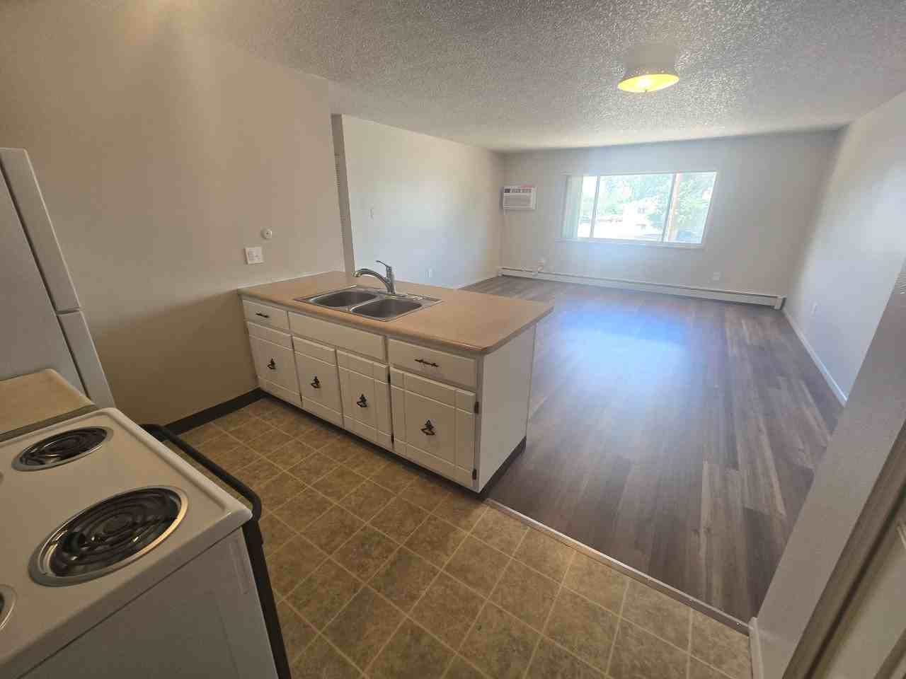 1691 Moore Ave | 1 & 2BR Apartments with Parking - Photo 4 of 31