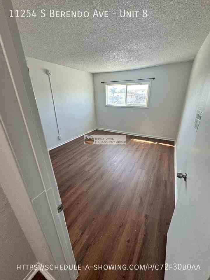 11254 Berendo Ave #8 - Photo 6 of 16