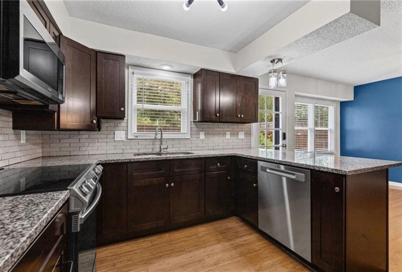 8933 Woodstone St - Photo 5 of 23
