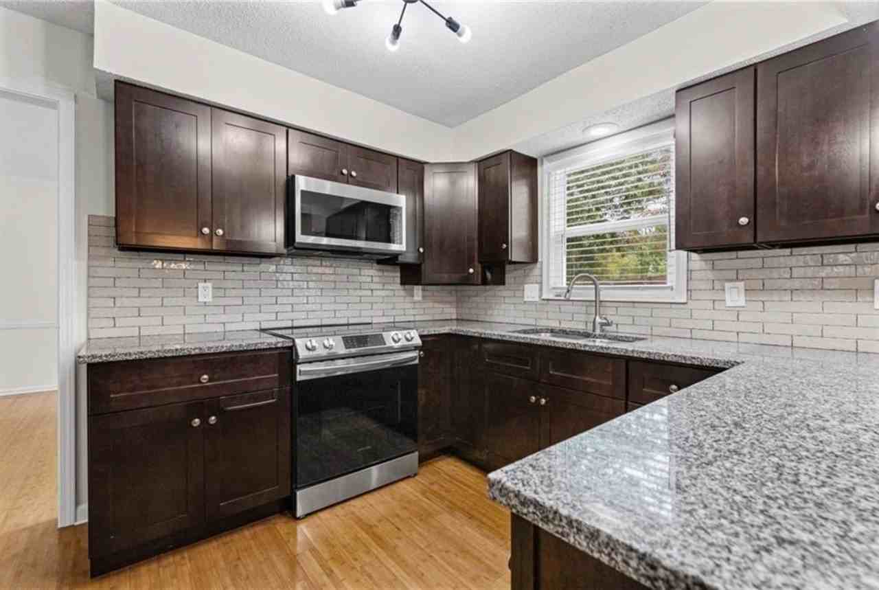 8933 Woodstone St - Photo 6 of 23