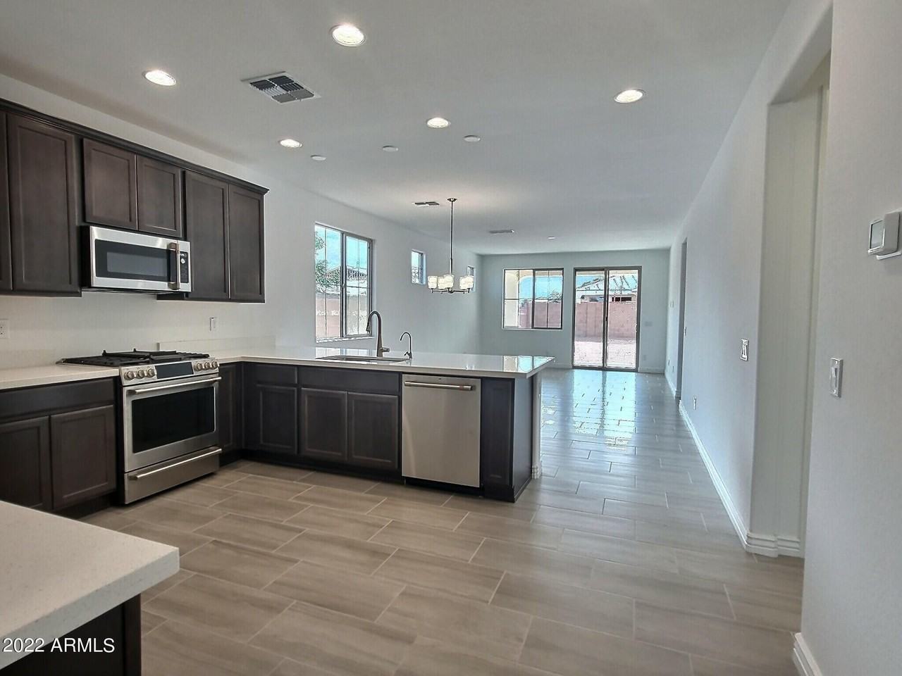 11011 E Tesla Ave - Photo 3 of 21