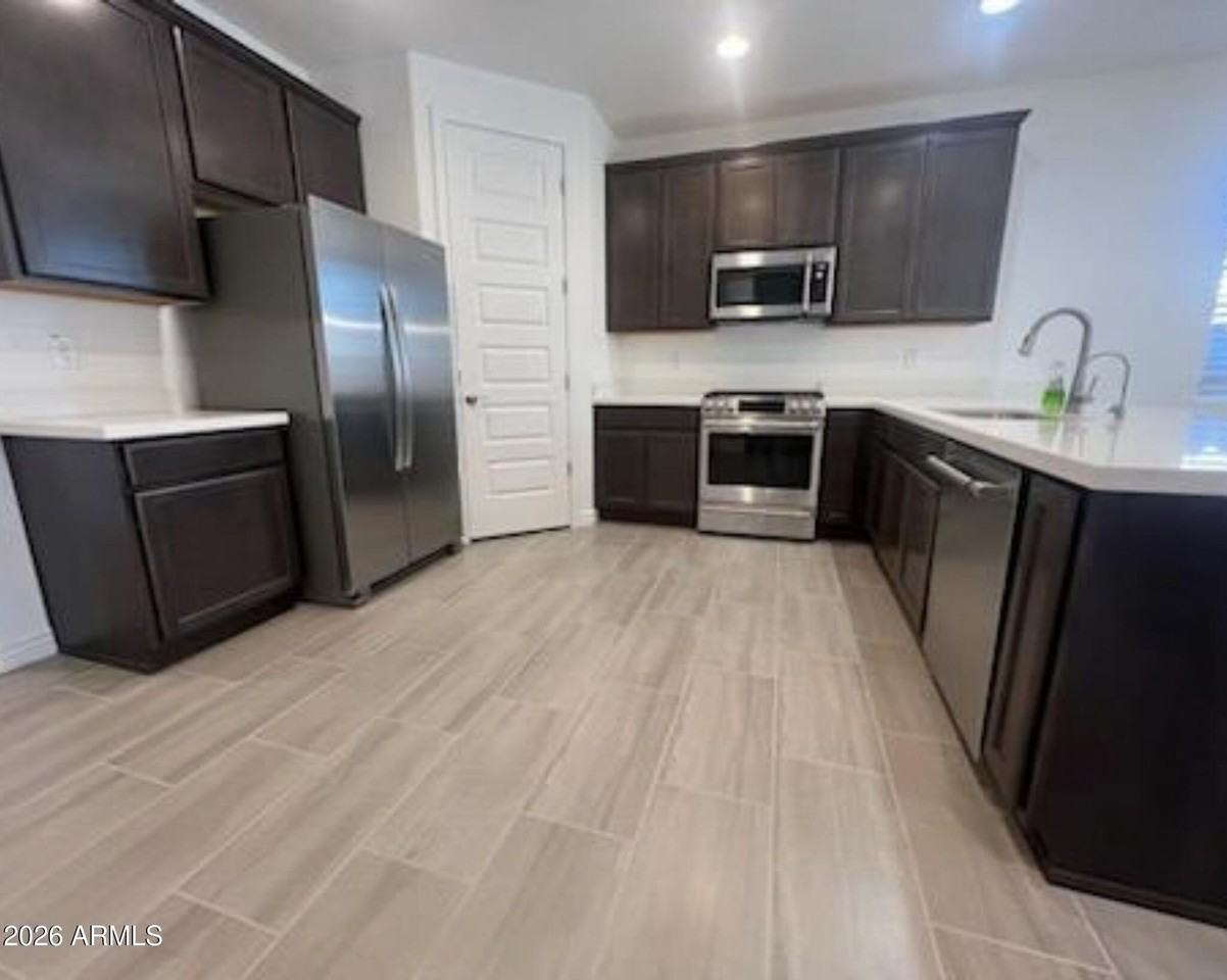 11011 E Tesla Ave - Photo 6 of 21