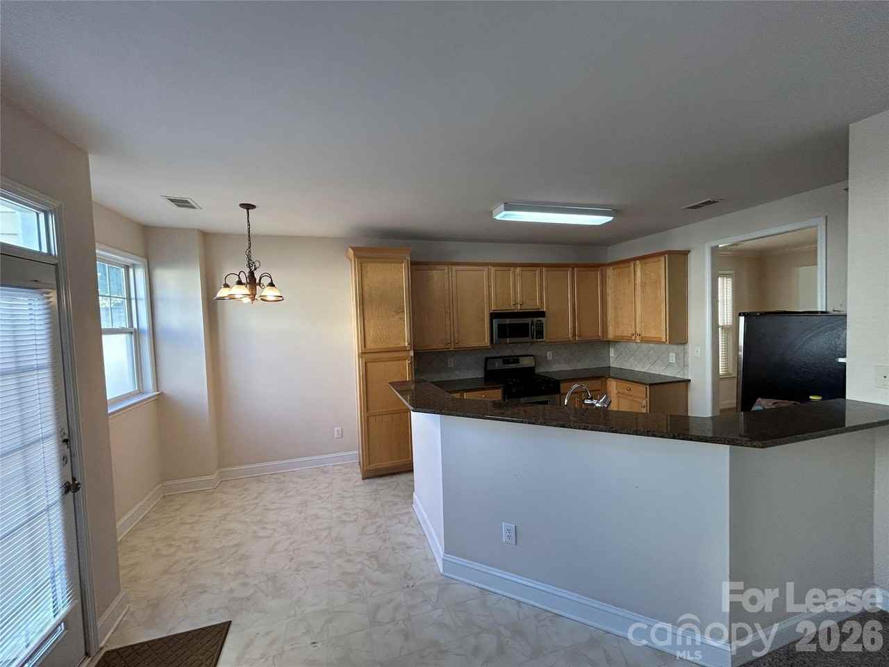9711 Cadman Ct - Photo 5 of 12