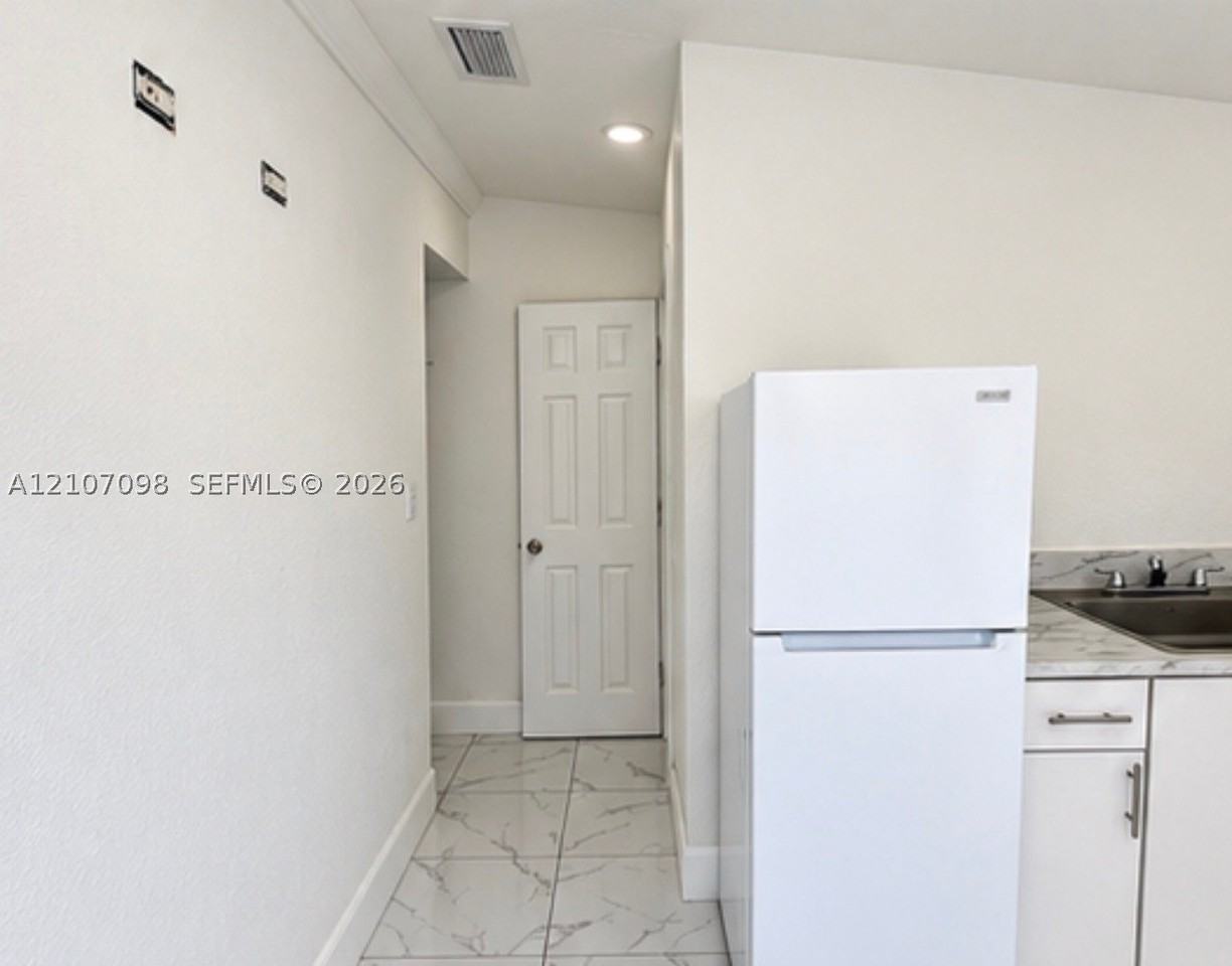 6497 W 8th Ln #A - Photo 3 of 5
