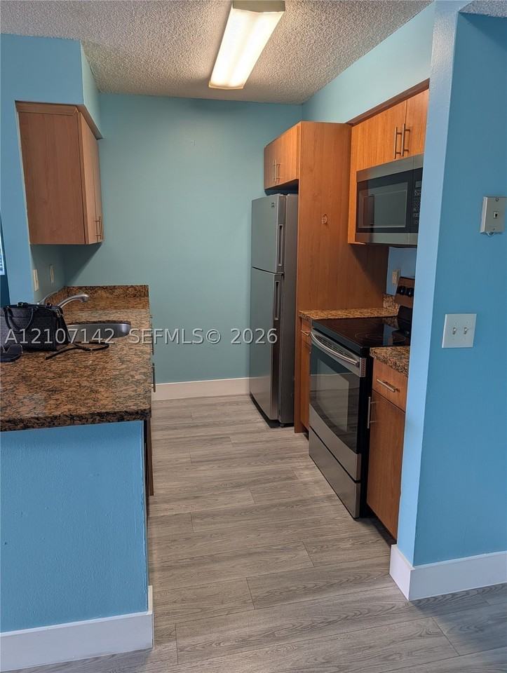 10473 Nw 7th St #103 - Photo 3 of 16