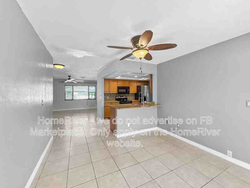 9032 Pomelo Rd W - Photo 5 of 24
