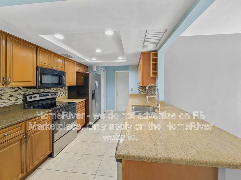9032 Pomelo Rd W - Photo 6 of 24