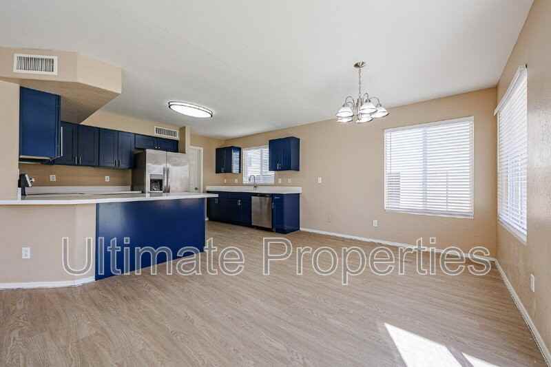 11911 N 148th Ave - Photo 4 of 40