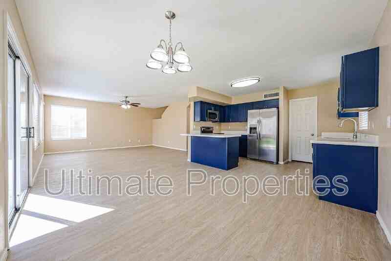 11911 N 148th Ave - Photo 5 of 40