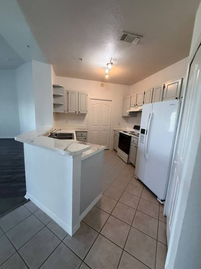 8816 Dunes Ct #301-1 - Photo 4 of 11
