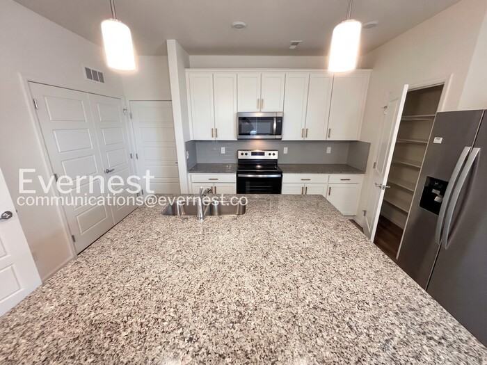 17707 E 103rd Ave - Photo 5 of 24