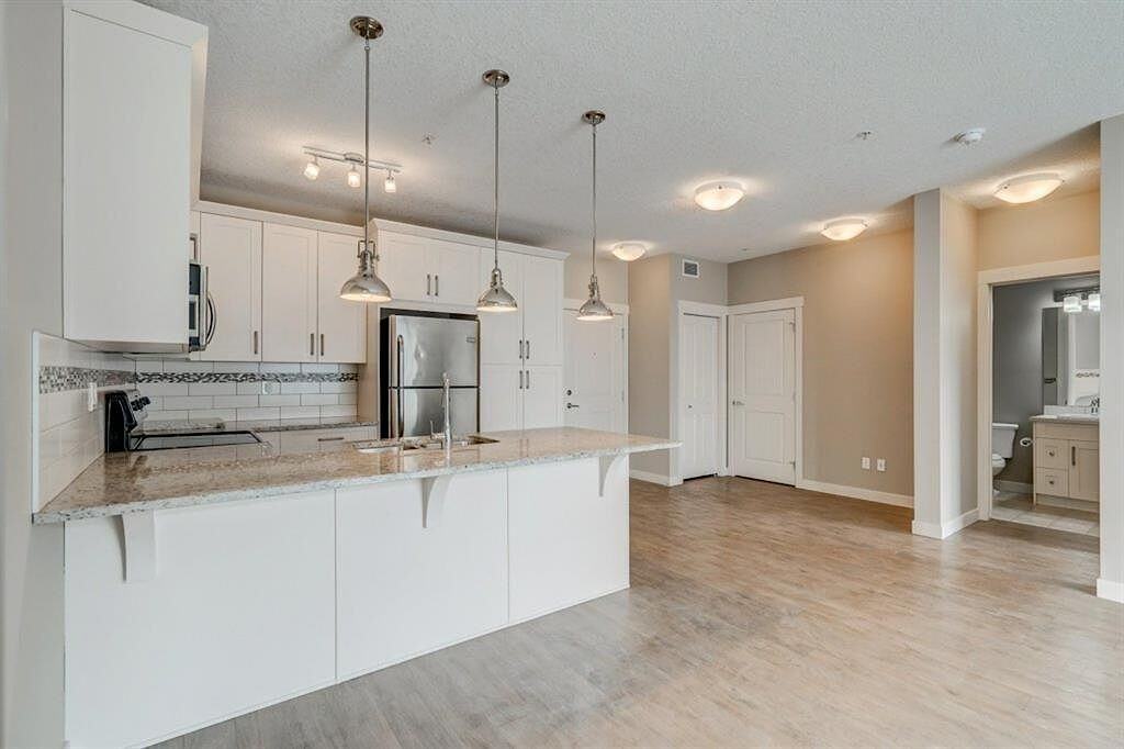 599 - 5303 - 522 Cranford Drive Southeast - Photo 2 of 12
