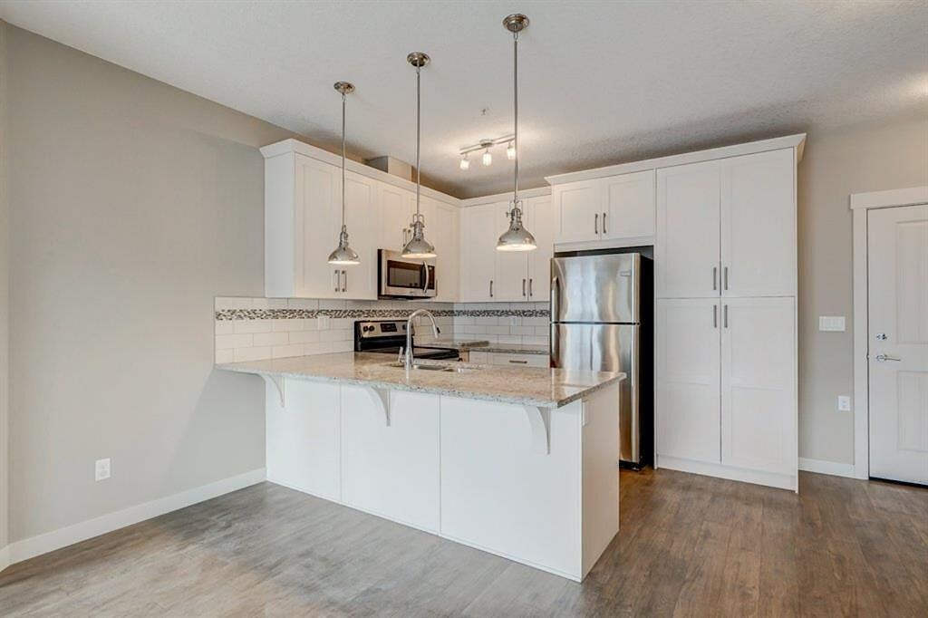 599 - 5303 - 522 Cranford Drive Southeast - Photo 5 of 12