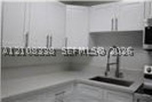1055 W 77th St #308 - Photo 1 of 1