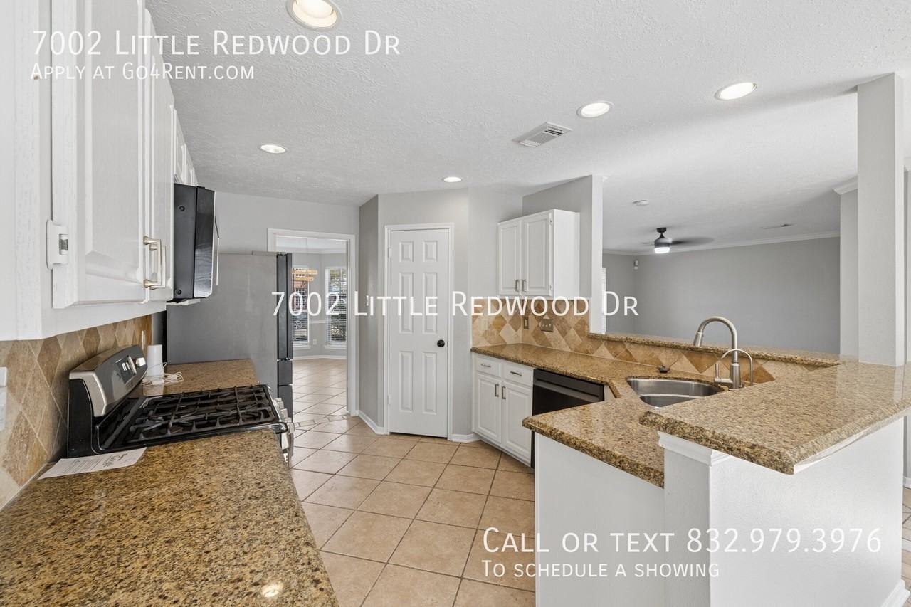 7002 Little Redwood Dr - Photo 6 of 21